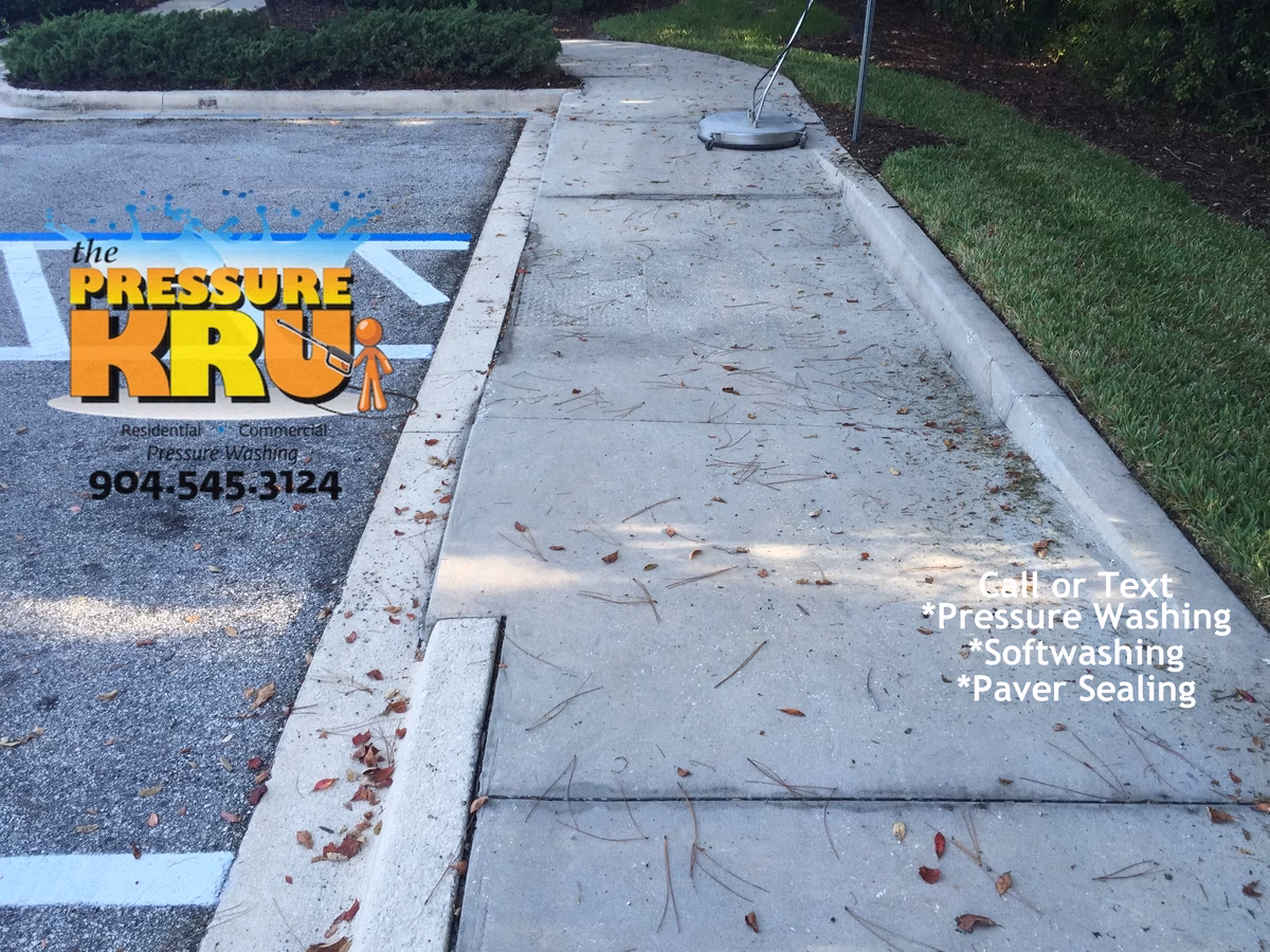 Professional concrete curb cleaning in Rivertown before
