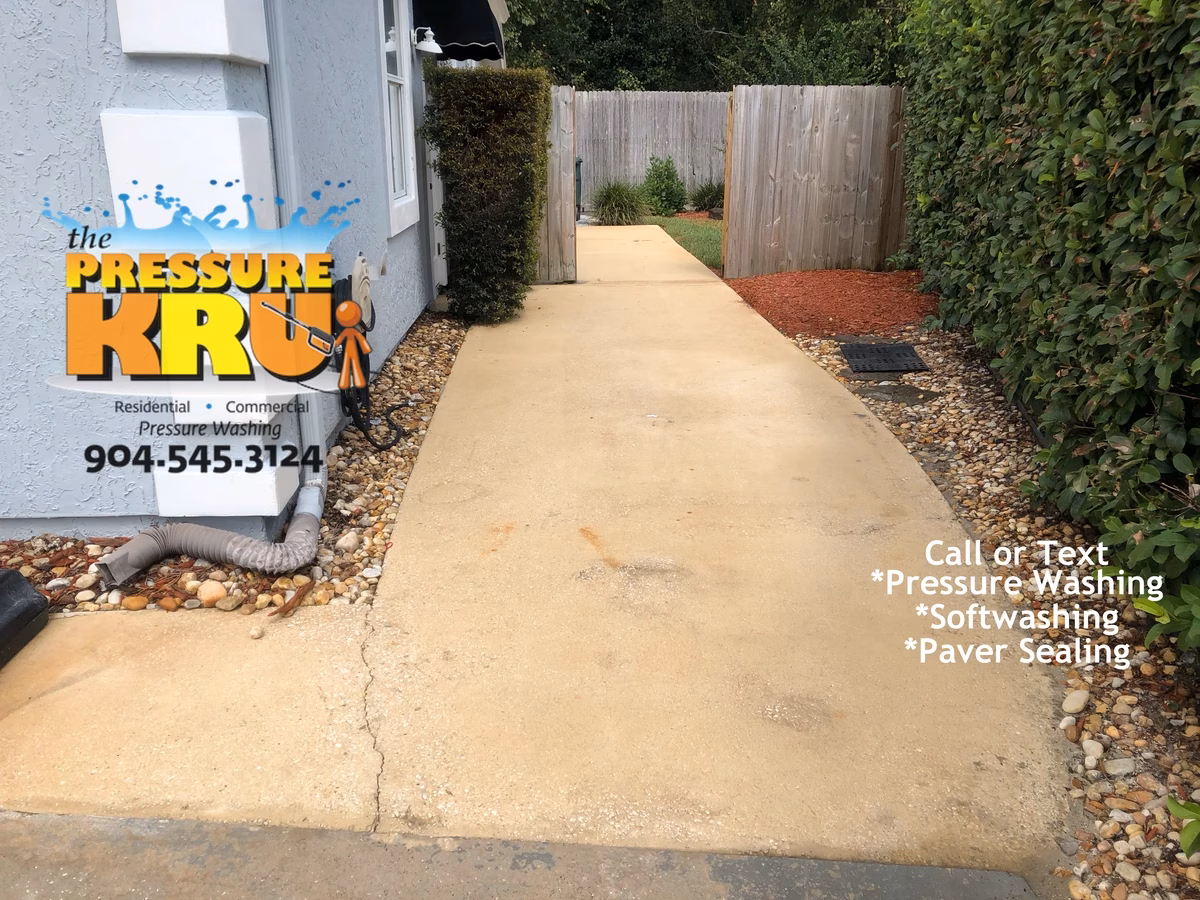 Local pressure washing pro handling tough driveway cleaning jobs near St. Augustine, FL. After cleaning picture.