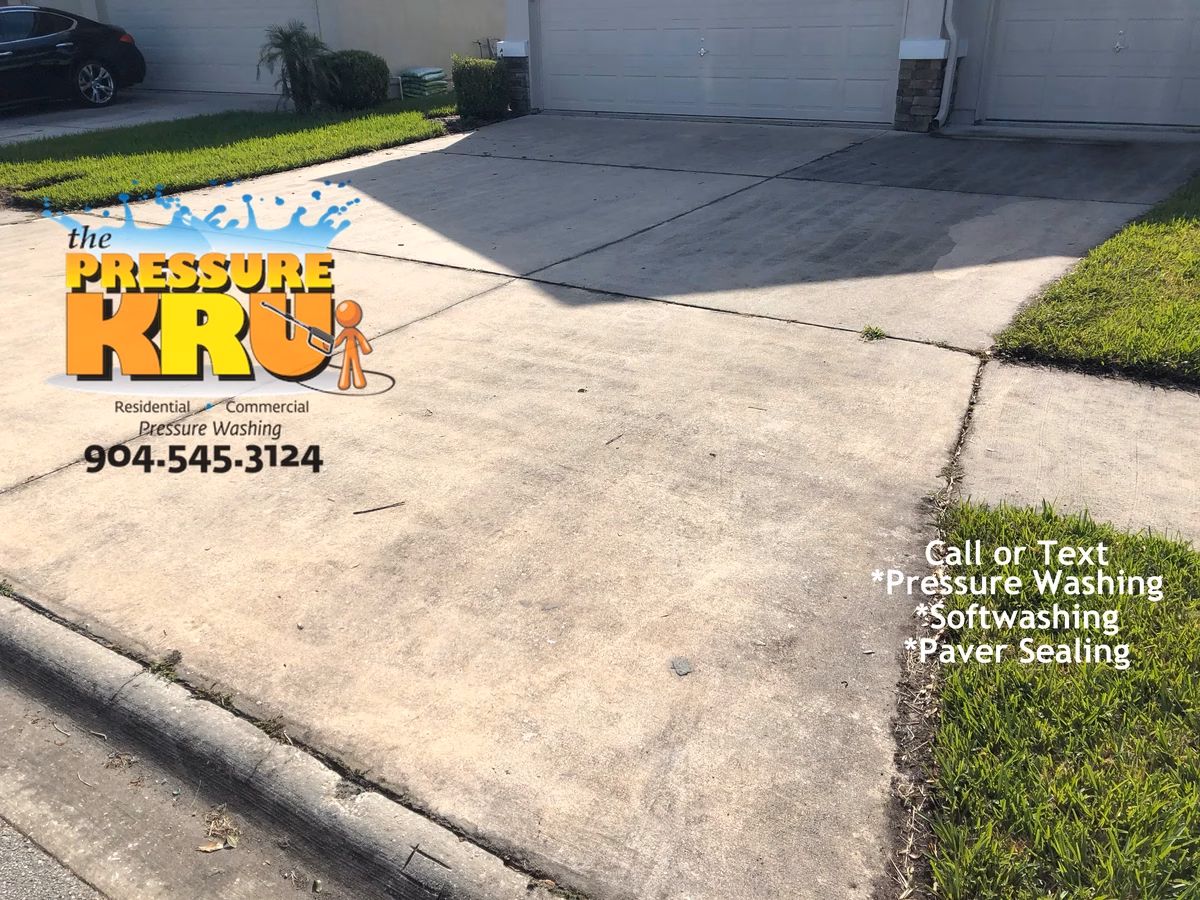 Freshly cleaned driveway ready for Summer in St. Augustine, FL. Before cleaning service.