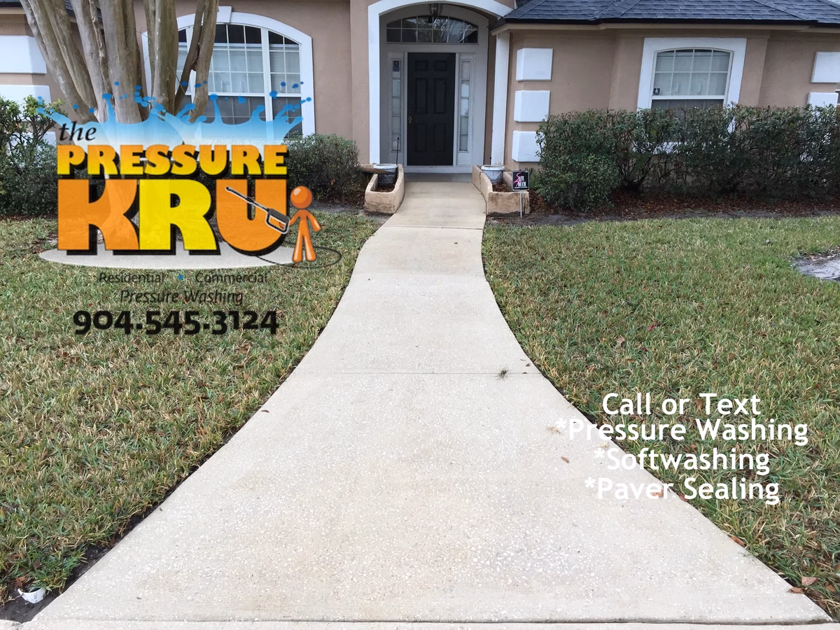 Safe Low-pressure washing for delicate concrete sidewalks and driveway in St. Augustine, FL. This was after cleaning.