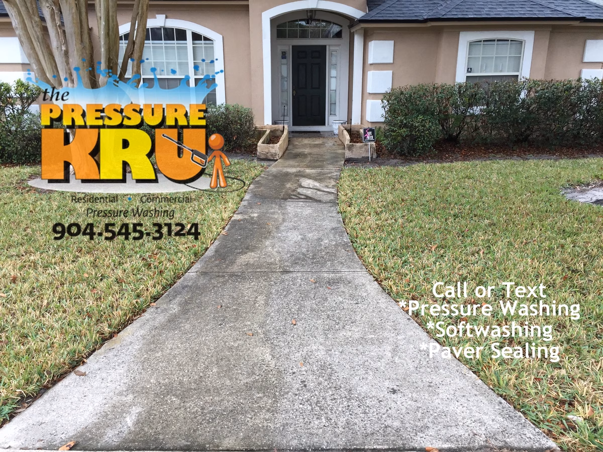 Safe Low-pressure washing for delicate concrete sidewalks and driveway in St. Augustine, FL. This was before cleaning.