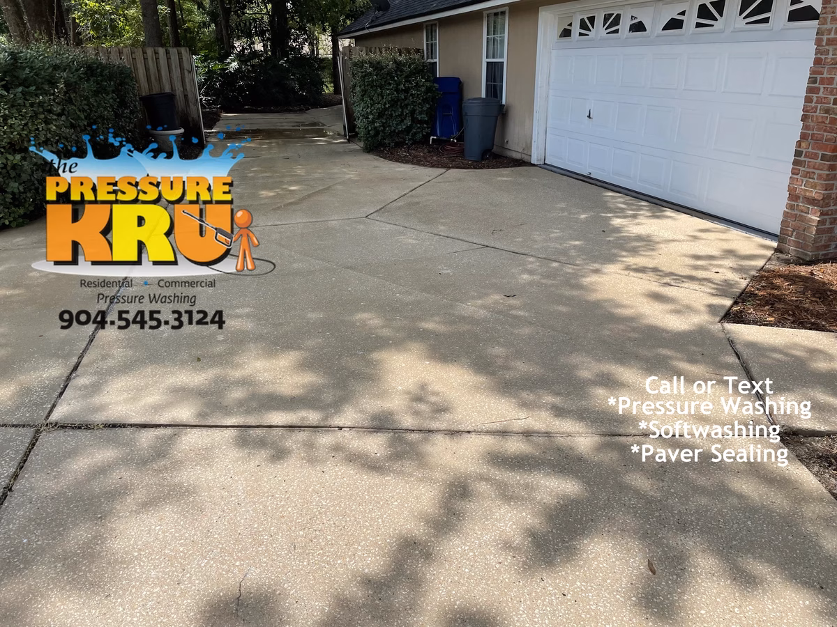 Professional power washing restoring faded driveway color in Jacksonville, Florida after cleaning. You cant get these results without hiring a pro.