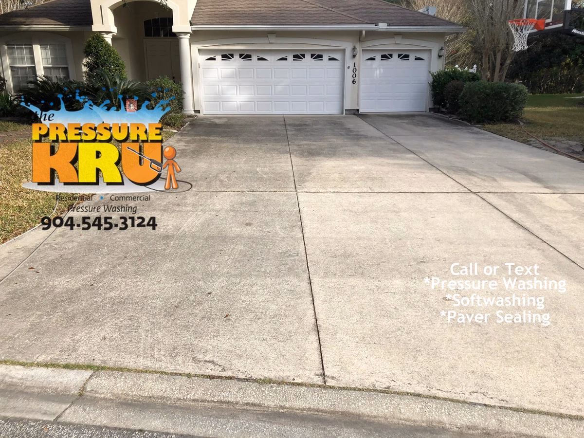 Local pressure washing company delivering perfect driveway cleaning result near Jacksonville, FL before service.