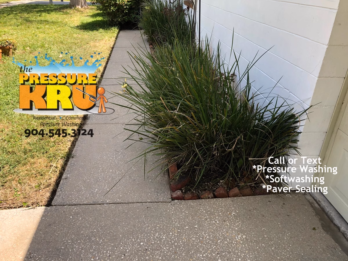 Power washing service after cleaning large residential driveway in St. Augustine, FL