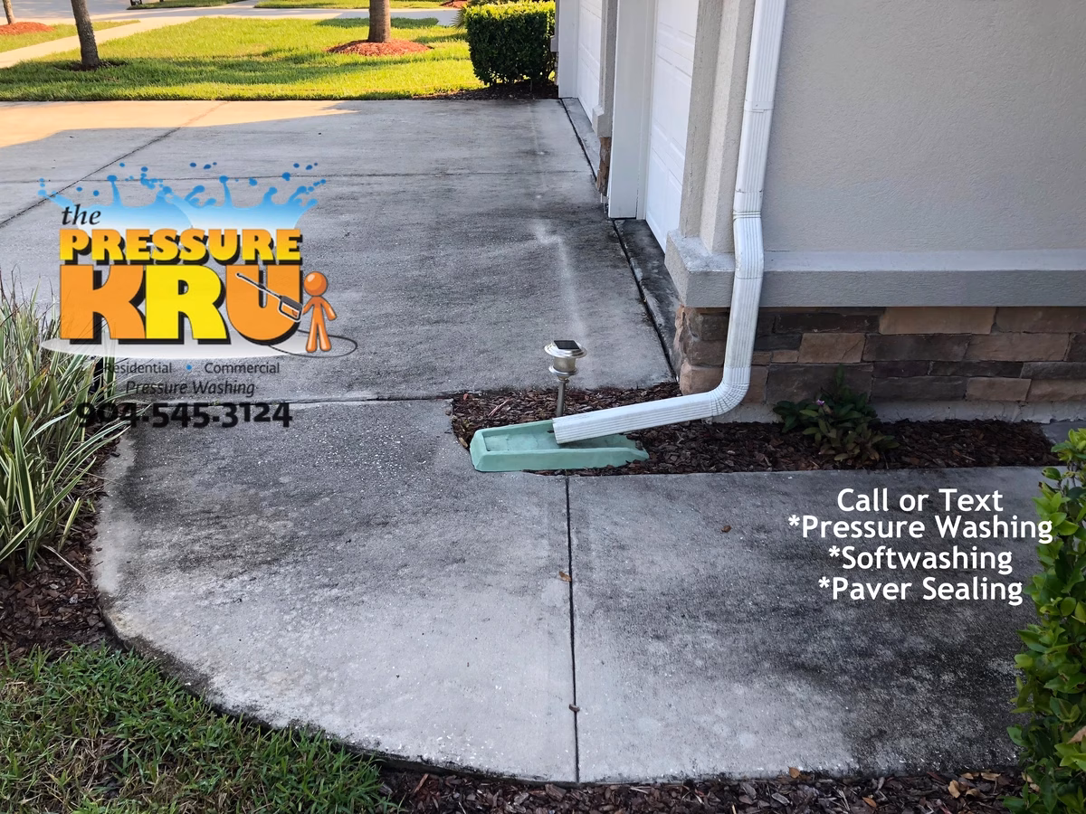 Spotless concrete driveway before power washing by local Ponte Vedra cleaning pros.