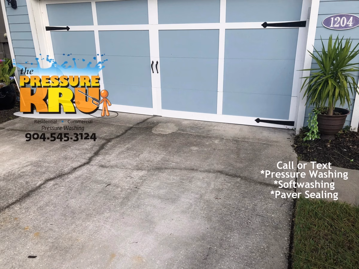 Professional pressure washing driveway before cleaning service in St. Johns, FL