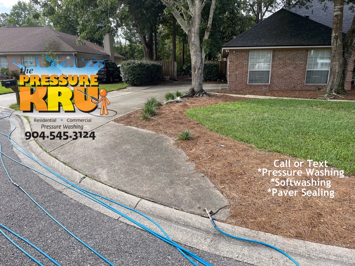 High pressure washing before removing moss and algae from driveway in Ponte Vedra, FL