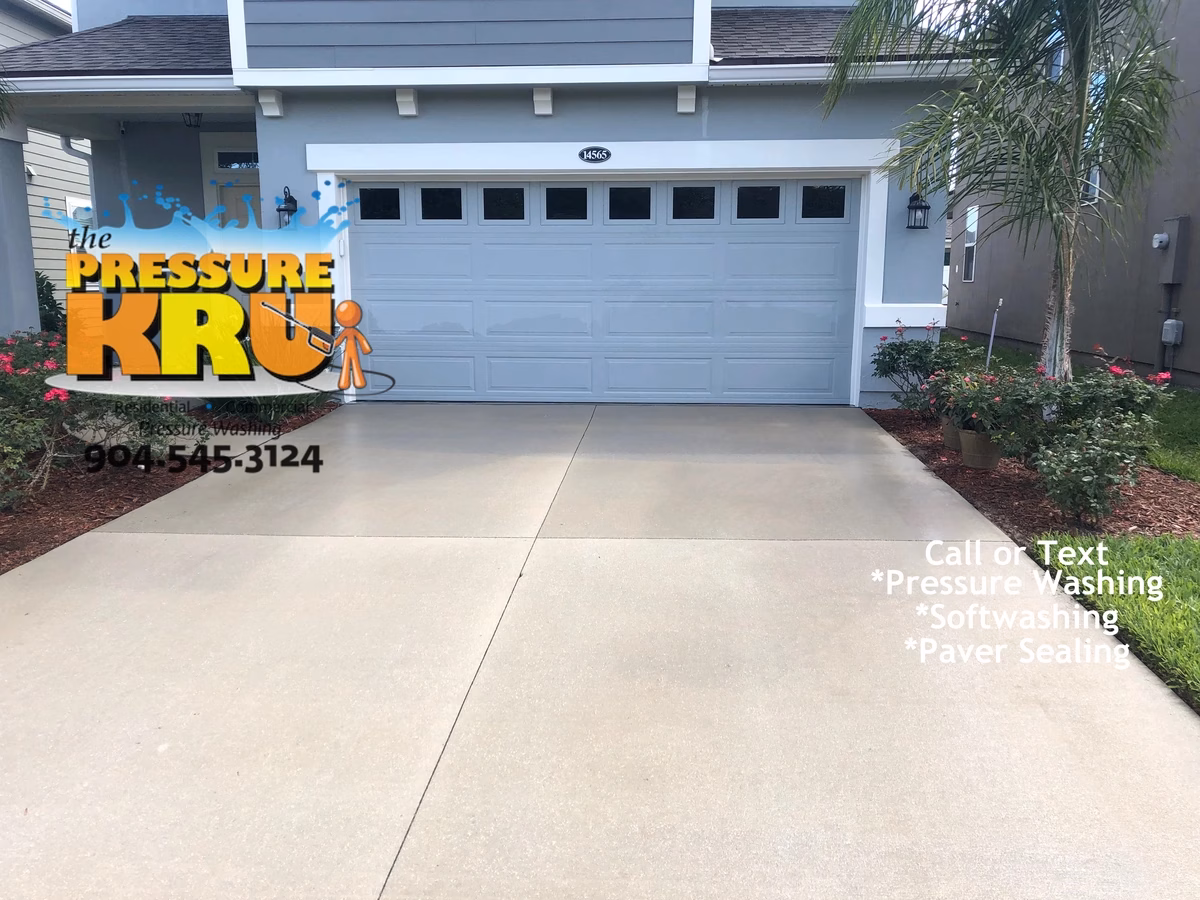 Beautiful clean paver driveway after expert cleaning and soft wash chemical treatment in St. Augustine, FL