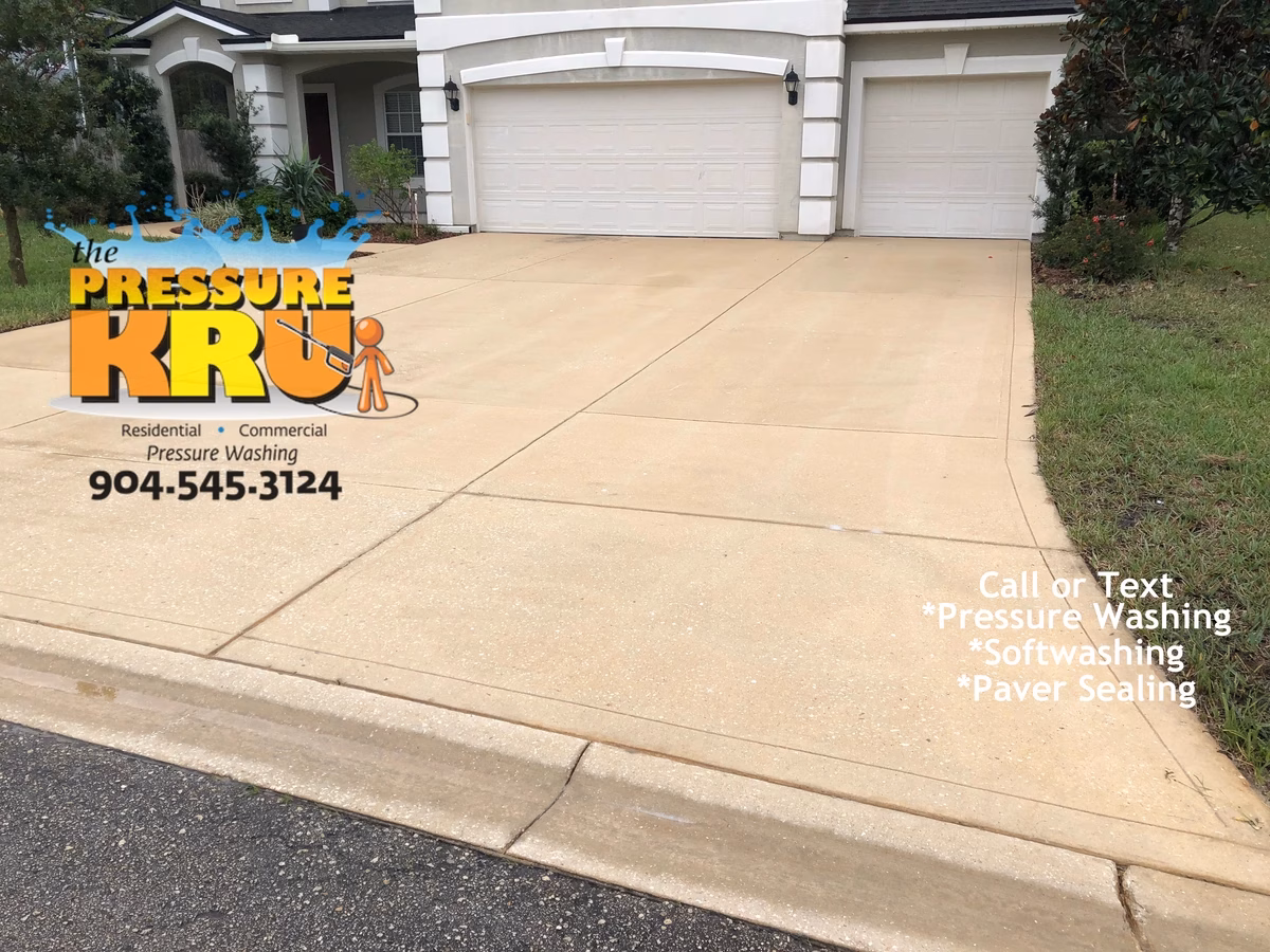 Local driveway cleaning company restoring curb appeal with soft wash chemicals in St. Johns, FL after.