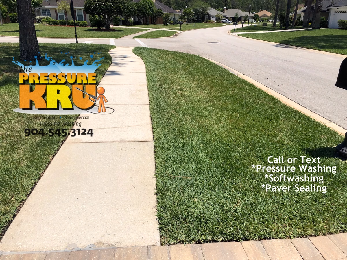 Power washing black mold from tiger striped driveway in Saint Johns, FL after.