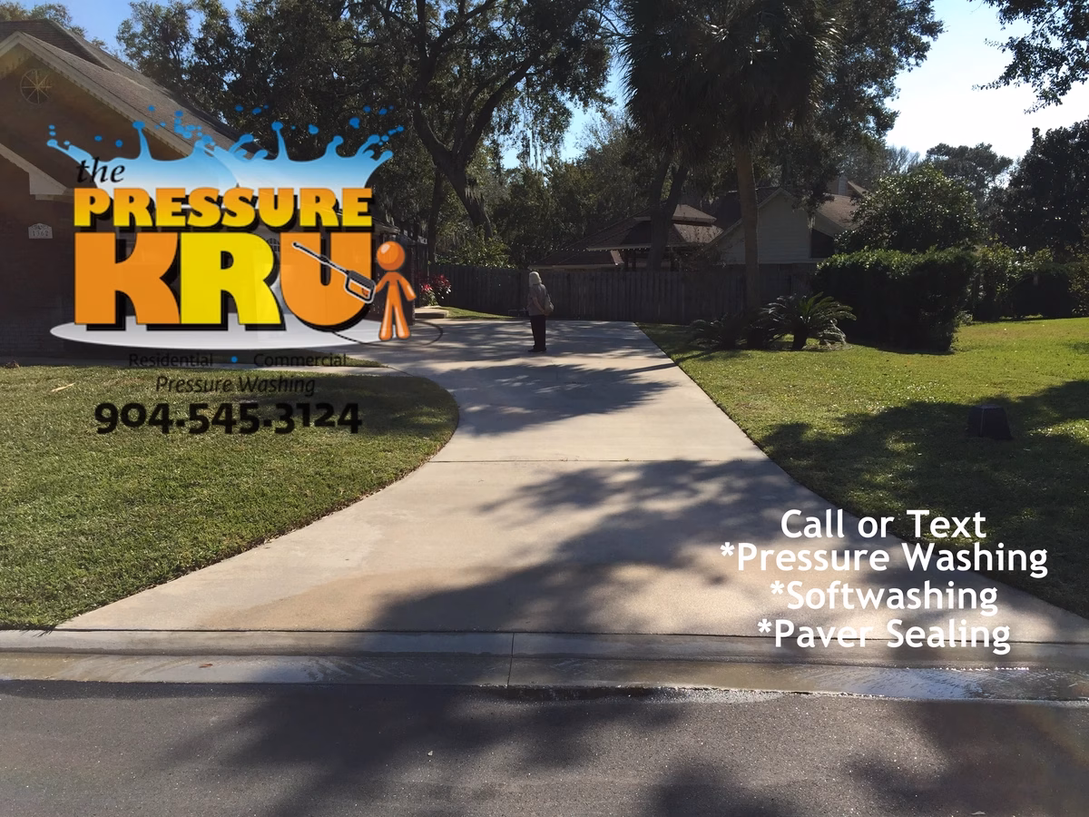 Top-rated driveway cleaning service transforming dirty driveway in St. Augustine, FL after.