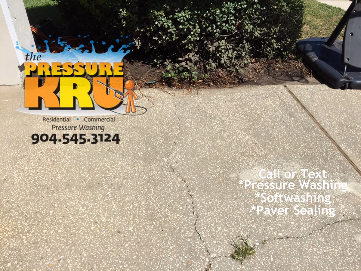 High pressure washing after removing moss and algae from driveway in St Augustine, FL.