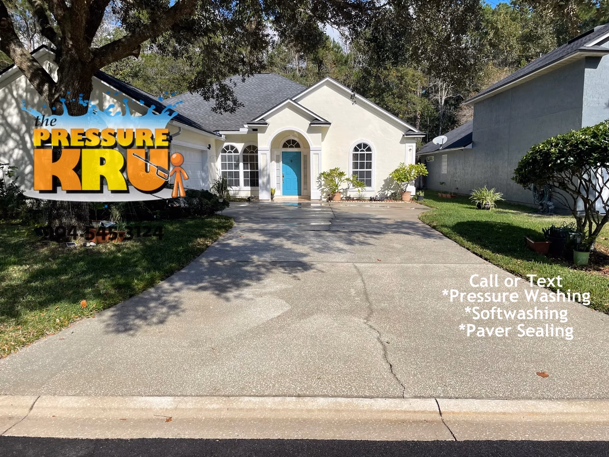 Professional pressure washing driveway after cleaning in St. Augustine, FL 32092