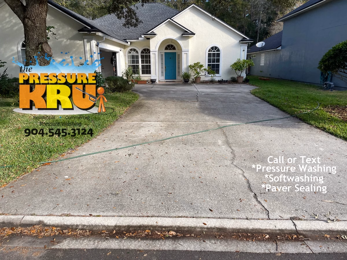 Professional pressure washing driveway before cleaning in St. Augustine, FL 32092