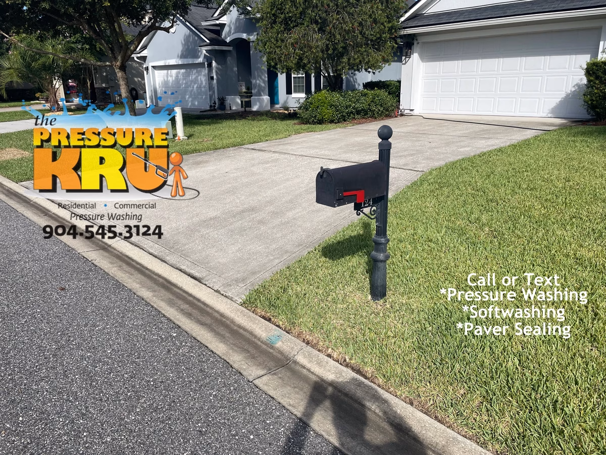 Professional power washing team before cleaning residential driveway near St. Johns, FL