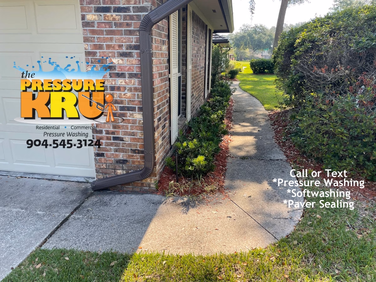 Spotless concrete driveway and walkway before pressure washing by The Pressure Kru in Saint Johns, FL.