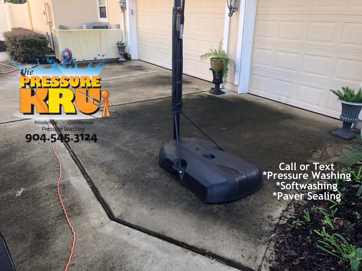 Expert Driveway cleaning before removing slippery thick algae with high pressure and chemical post treatments in St Johns, FL.