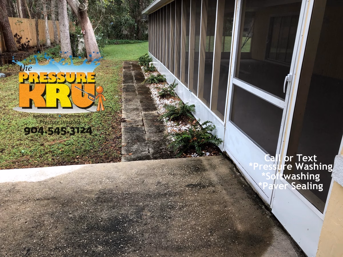 Top-rated driveway cleaning service transforming dirty driveways in Jacksonville, FL. This was before service.