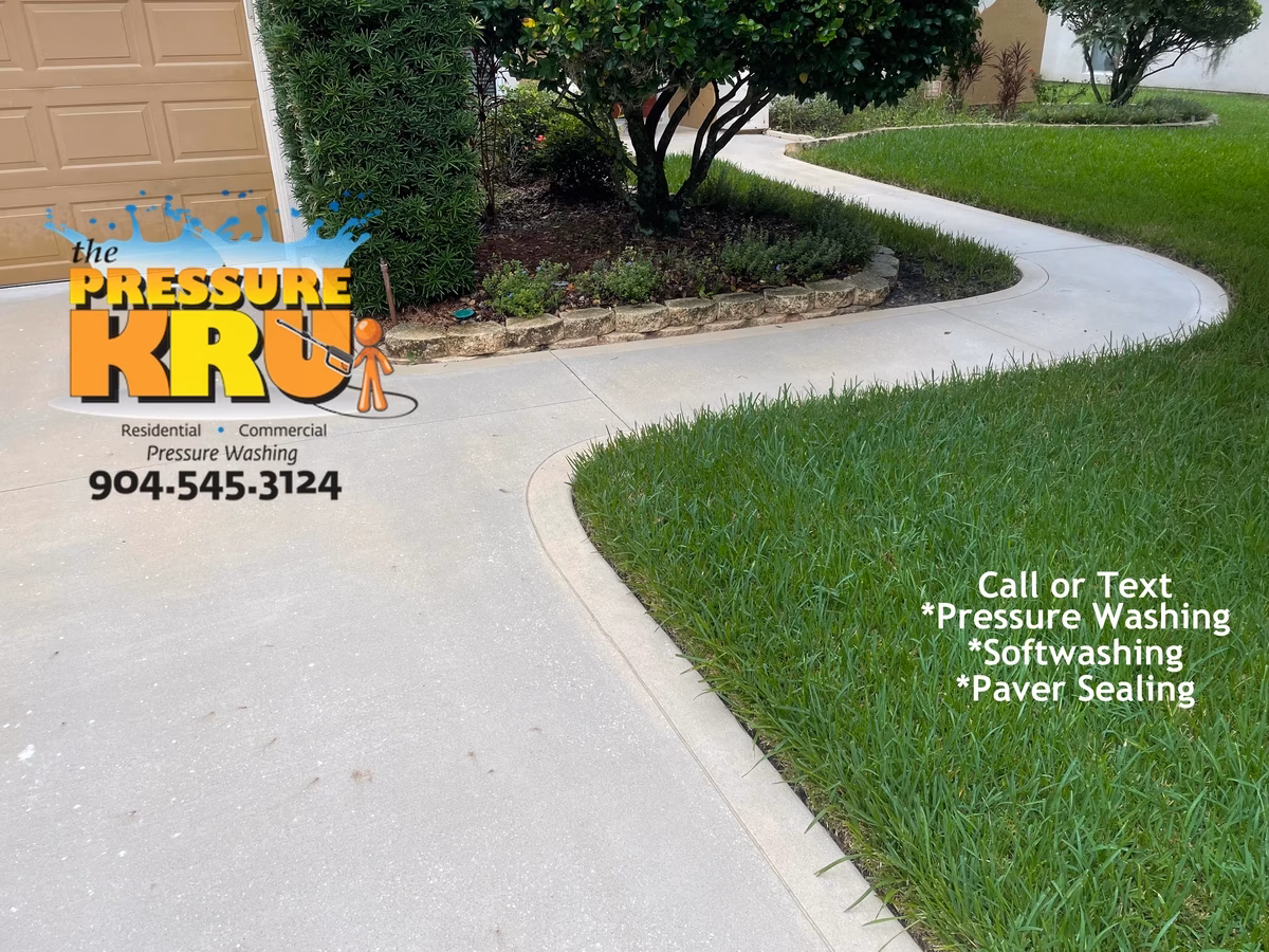 Beautiful clean concrete driveway after expert cleaning in St. Augustine, FL