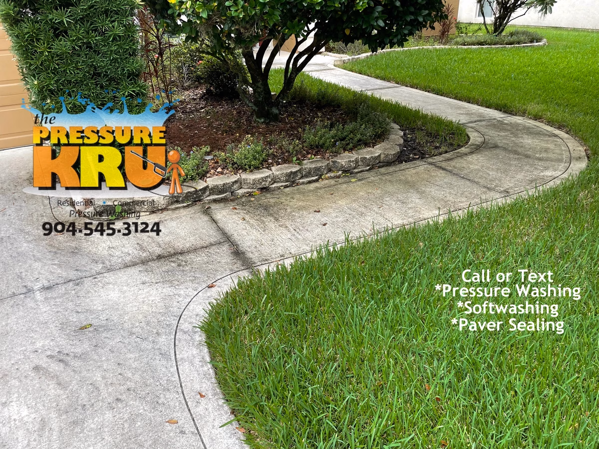 Beautiful clean concrete driveway before expert cleaning in St. Augustine, FL