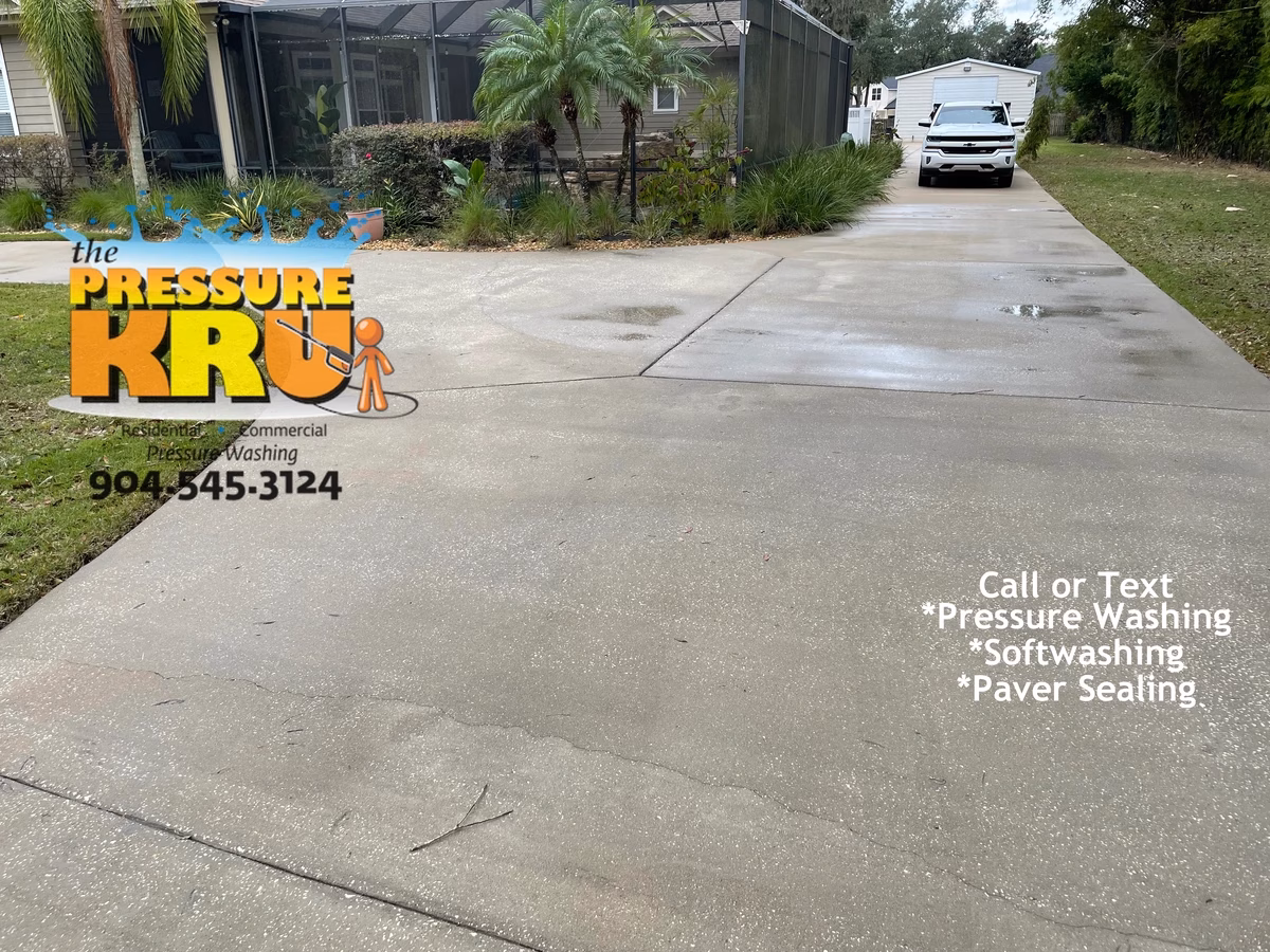 10,000 square foot residential concrete driveway cleaning in Ponte Vedra, FL. This image is after our cleaning service.