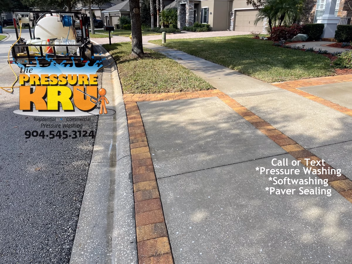 After organic stain removal from driveway using eco-friendly pressure washing in St. Johns, FL