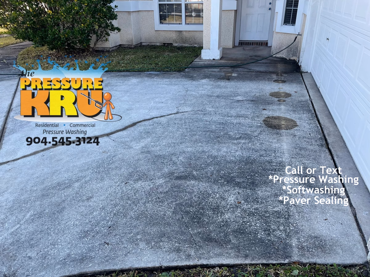 Before driveway pressure washing completed for residential property in Fruit Cove, FL