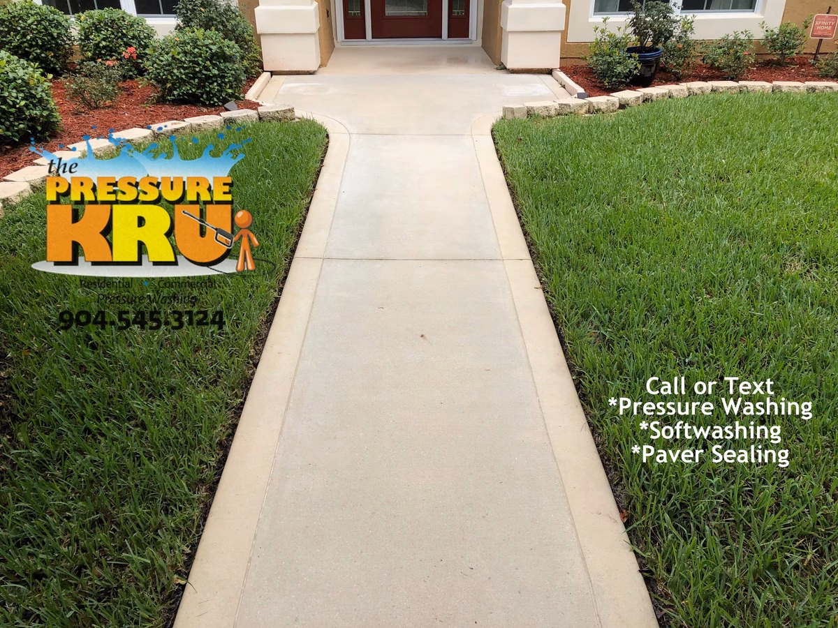 Sidewalk and driveway after restoration in Saint Johns, FL.