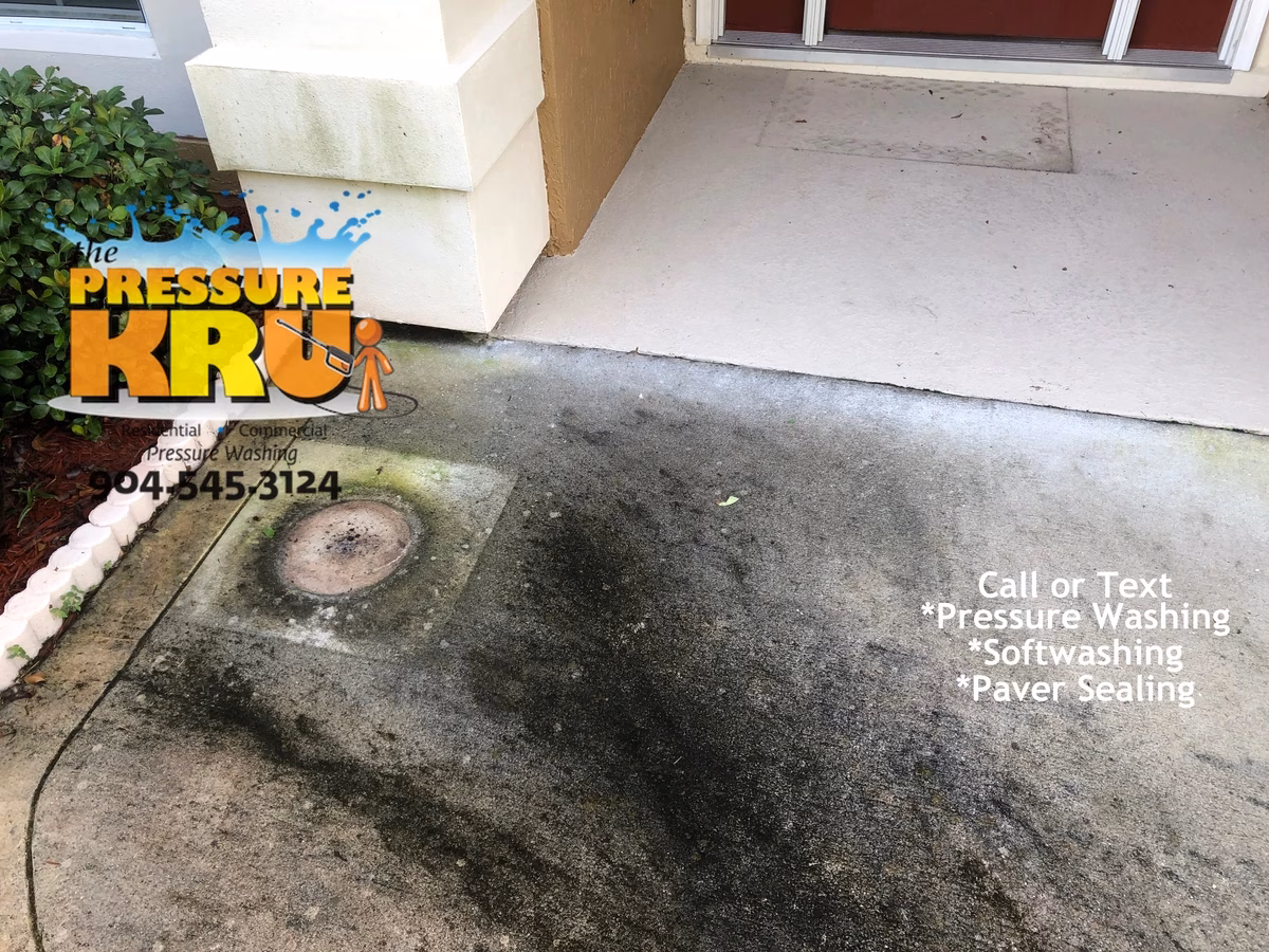 Freshly cleaned driveway and walkway in Saint Johns, FL restoring surface.