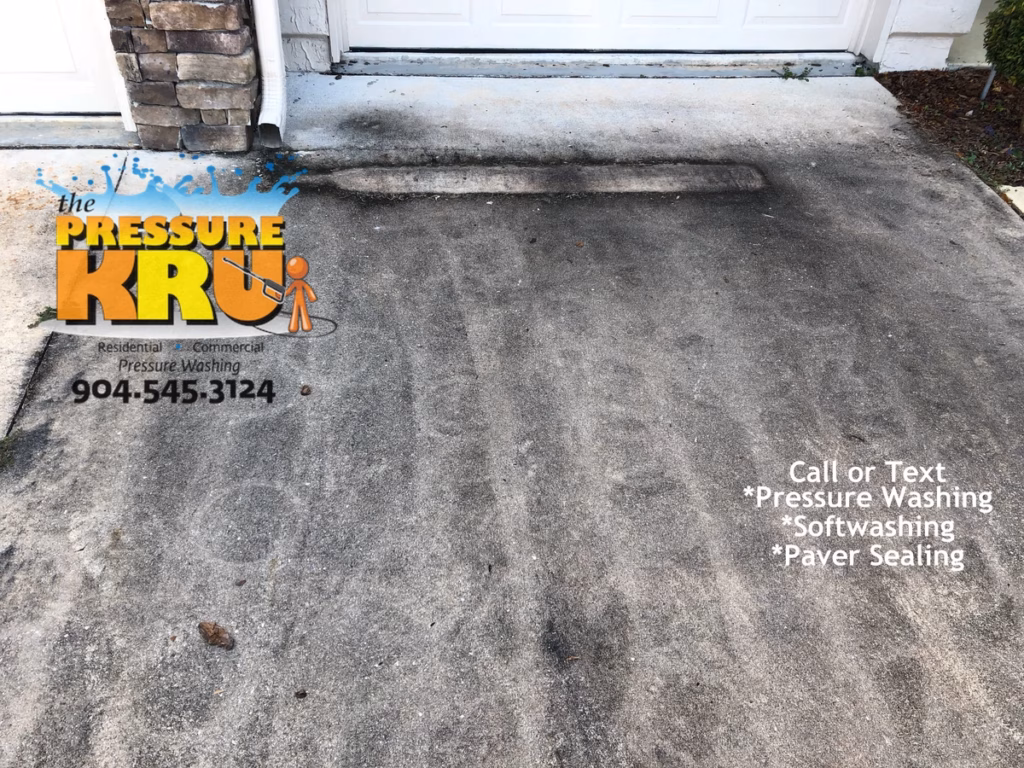 Professional driveway cleaning in St. Augustine, FL before improving curb appeal.