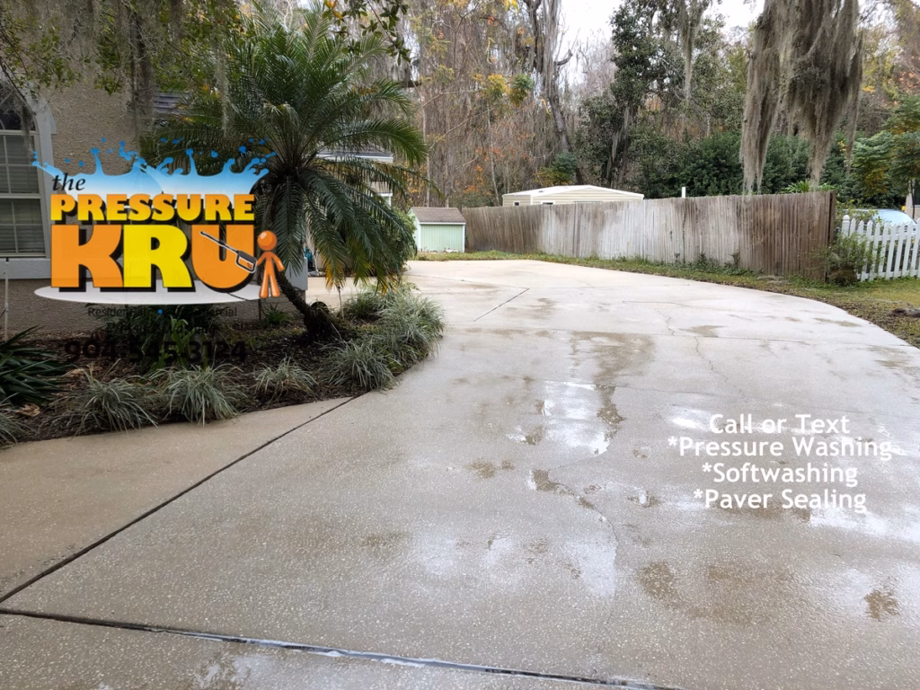 Pressure Washing Driveway after removing organic stains in St. Johns, FL.