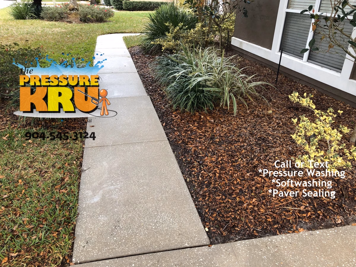 Sidewalk and driveway cleaning in Fruit Cove, FL after professional magic.