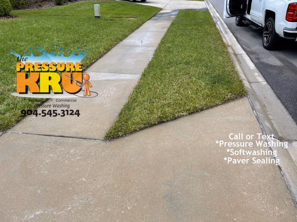 Driveway and sidewalk pressure washing in Jacksonville, FL. after proper cleaning. The half hearted bandit strikes please take notes.