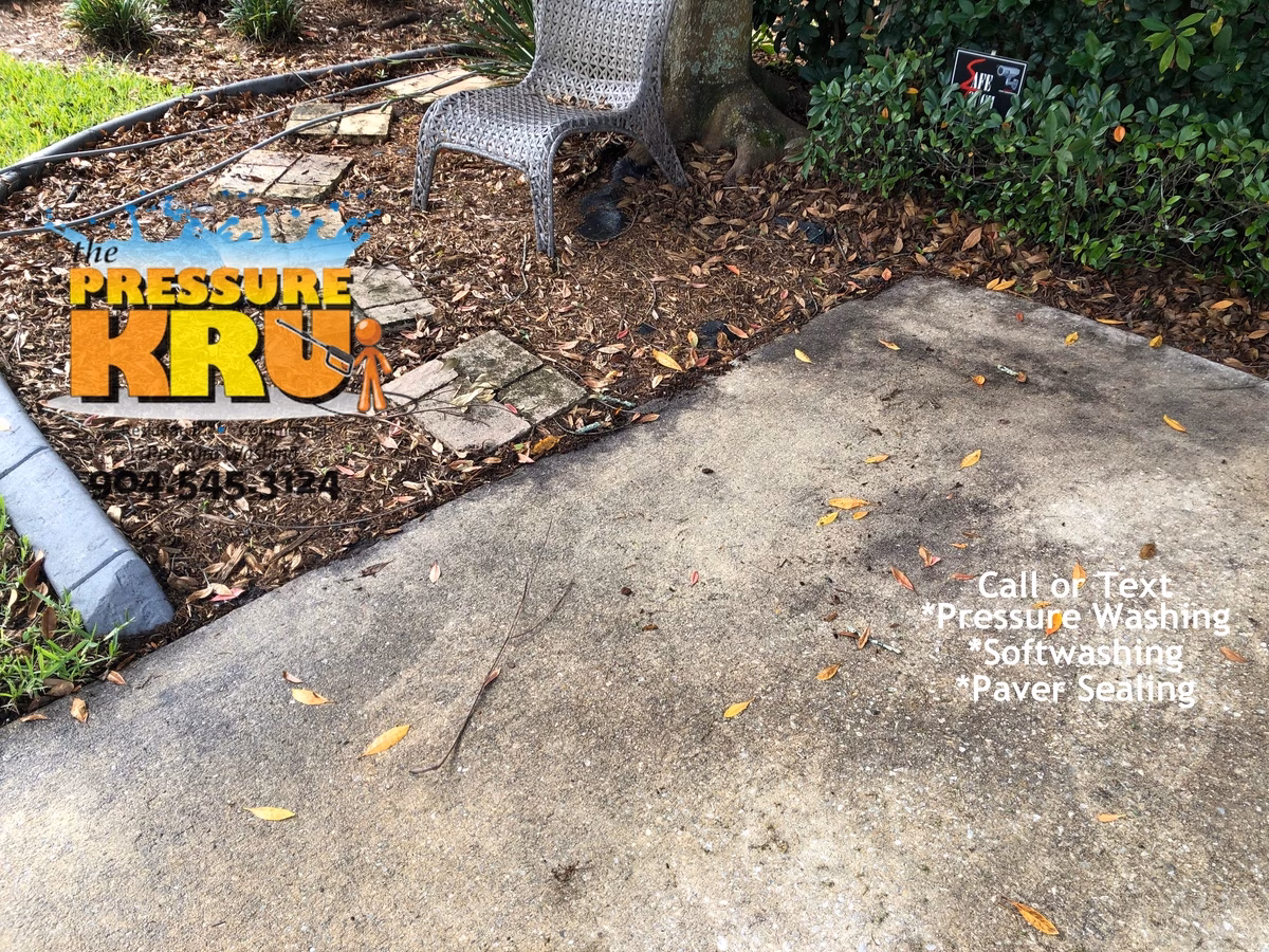 Before driveway pressure washing in St. Johns, FL.