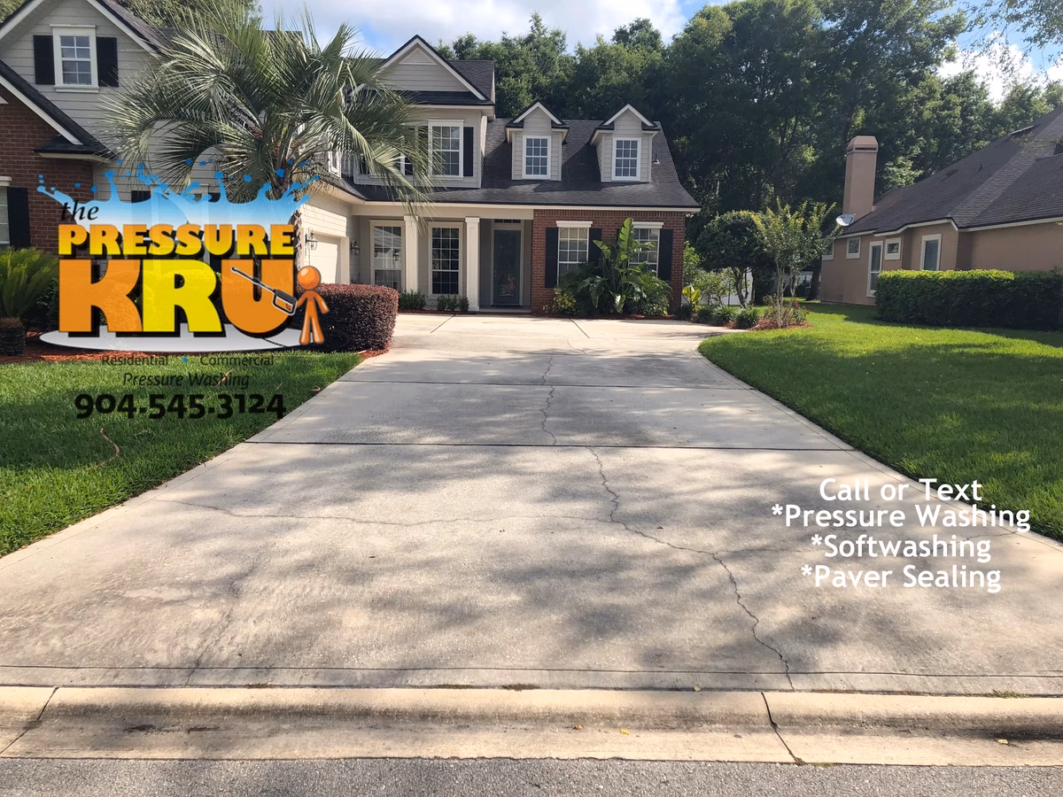 Professional driveway cleaning removing dirt and mildew in St. Johns, FL. Before starting work.