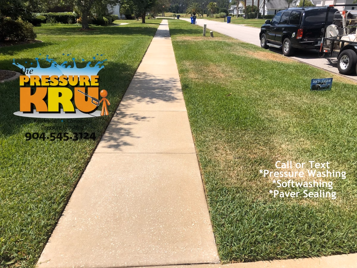 After driveway and sidewalks pressure washing at a St. Augustine, FL home