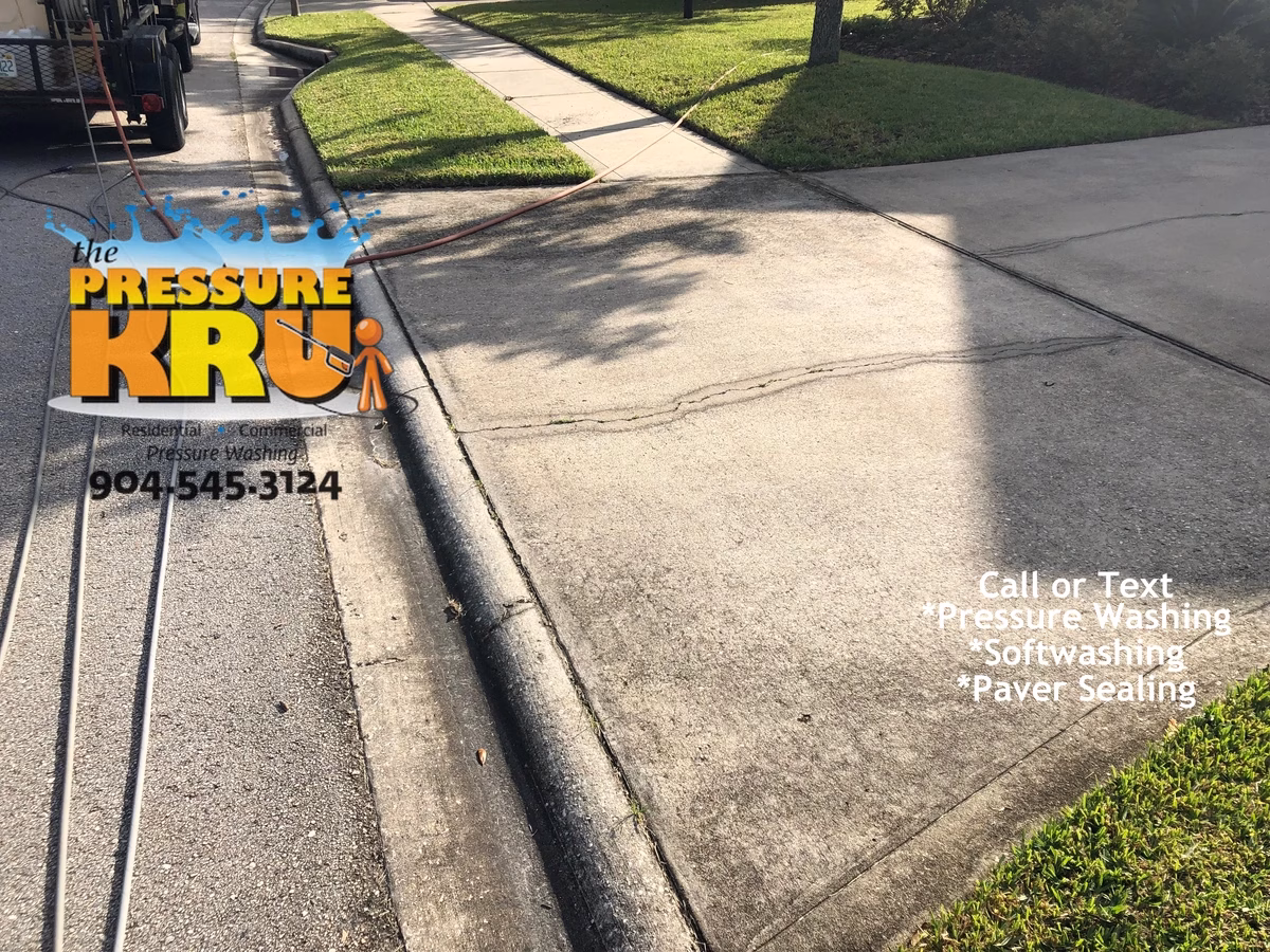 Professional driveway surface cleaning in St. Augustine, FL 32092 before service.