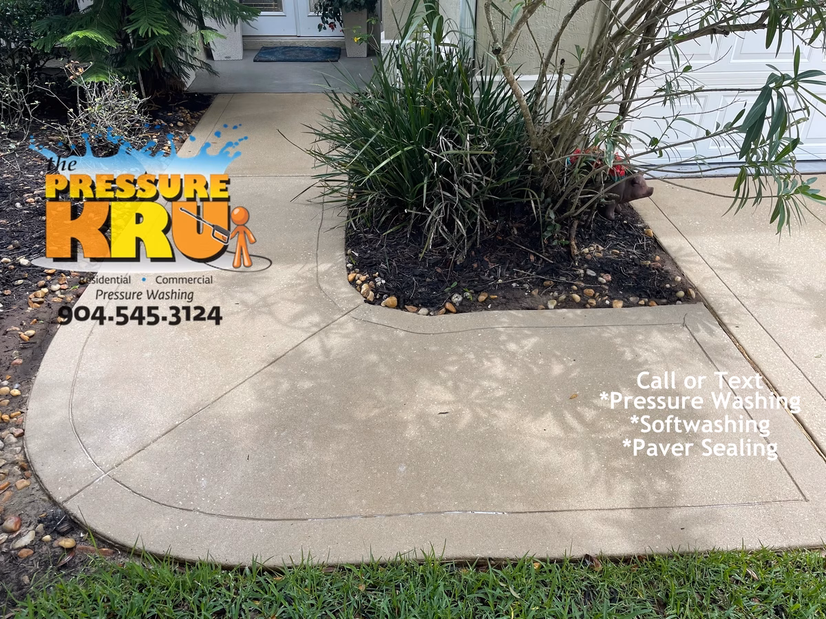 Pressure washing driveway in St. Augustine, FL 32092 after softwashing.