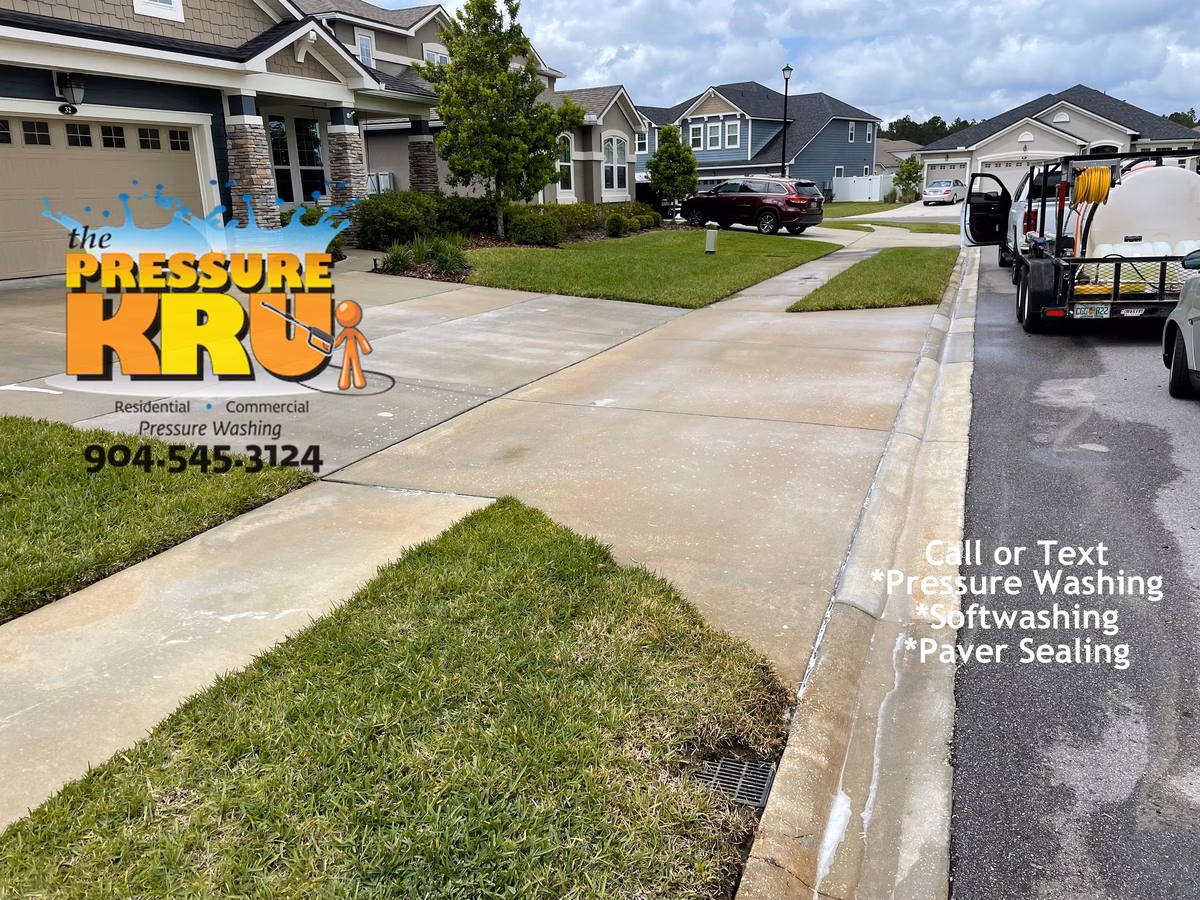 Green Cove Springs, FL neighborhood driveway after pressure washing.