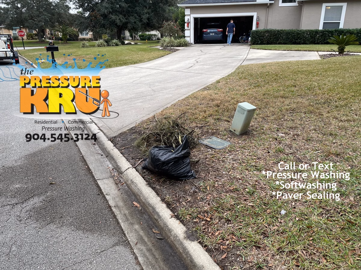 Before clean residential driveway following professional pressure washing service in St. Augustine, FL. 32092.