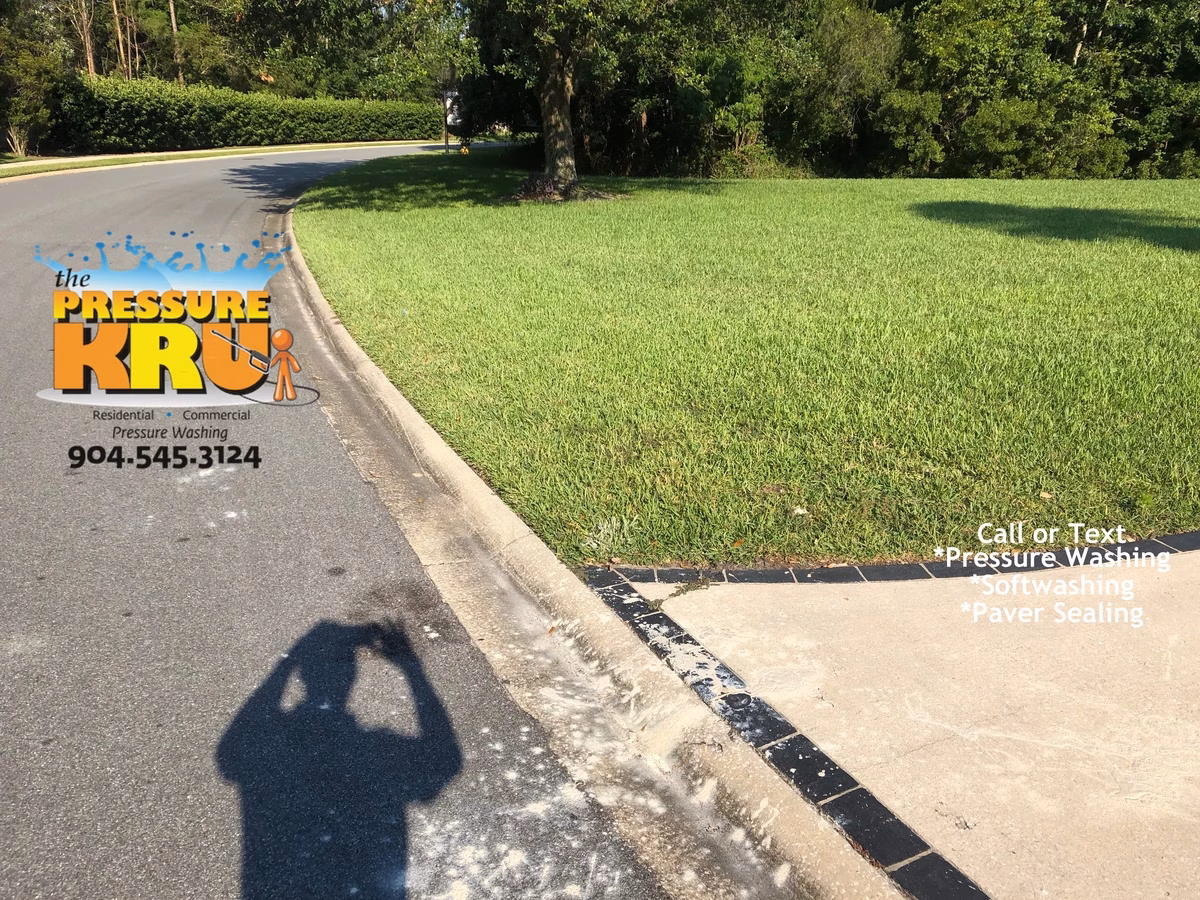 Curb edge pressure washing and paint removal in Saint Johns, FL before