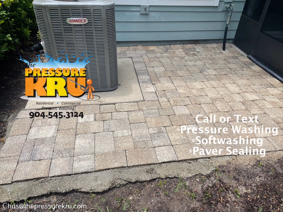 Residential paver patio pressure washing while customers at work in Bartram Park after