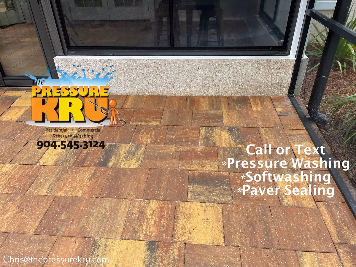Residential patio pressure washing after soft washing in Julington Creek Plantation.