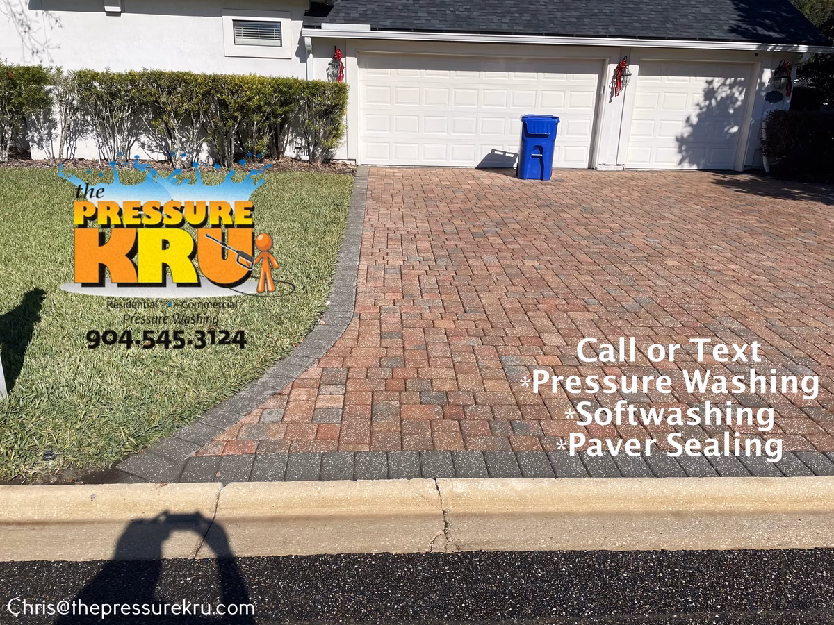 Professional paver driveway restoration after cleaning in Mandarin, FL.