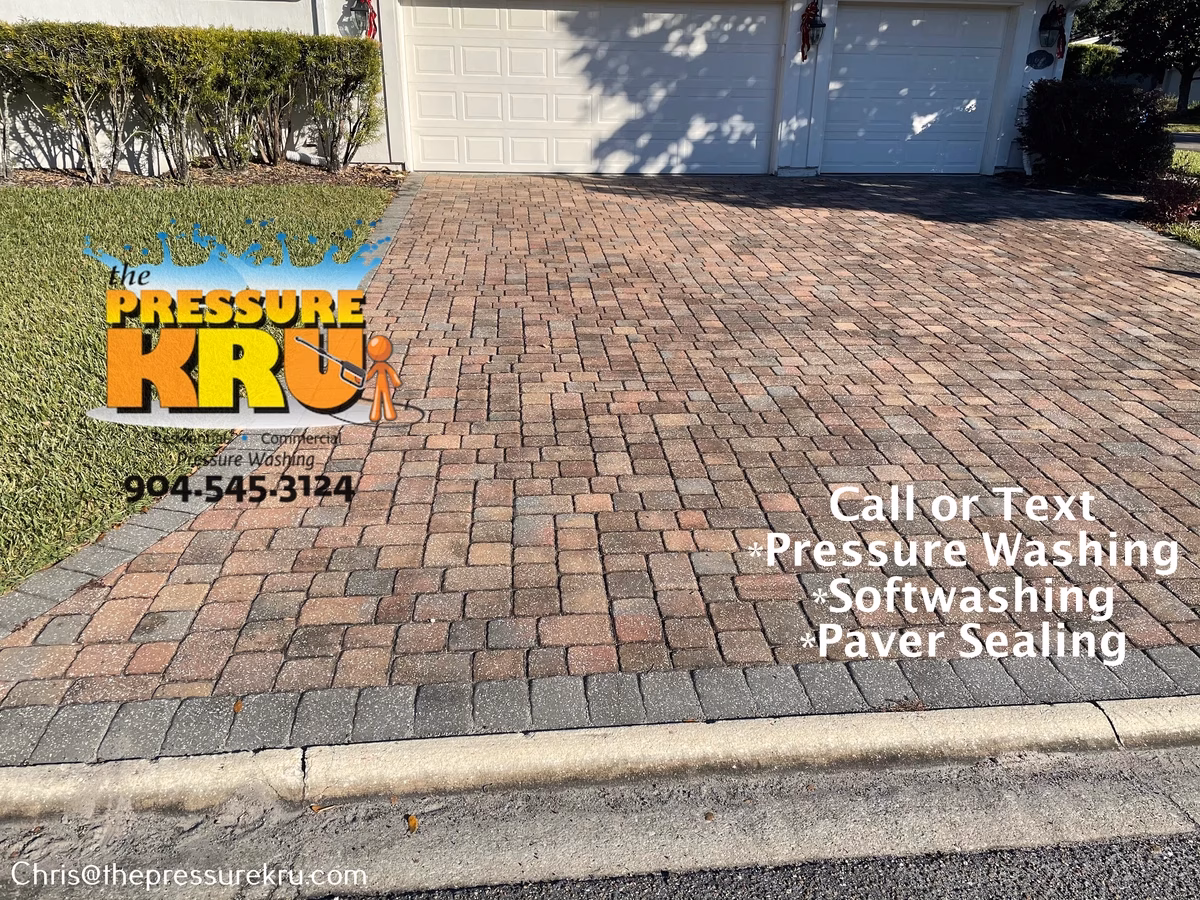 Professional paver driveway restoration before cleaning in Mandarin, FL.