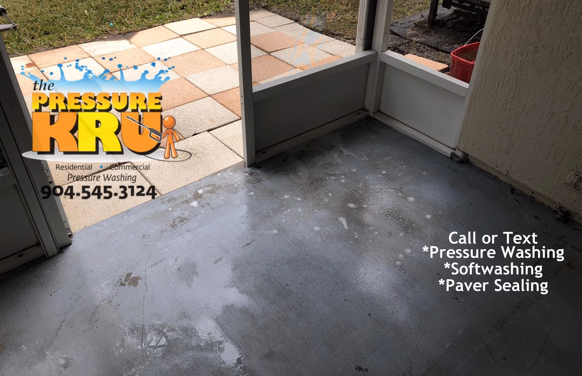 Pressure wash dirty painted concrete patio in Bartram Springs after