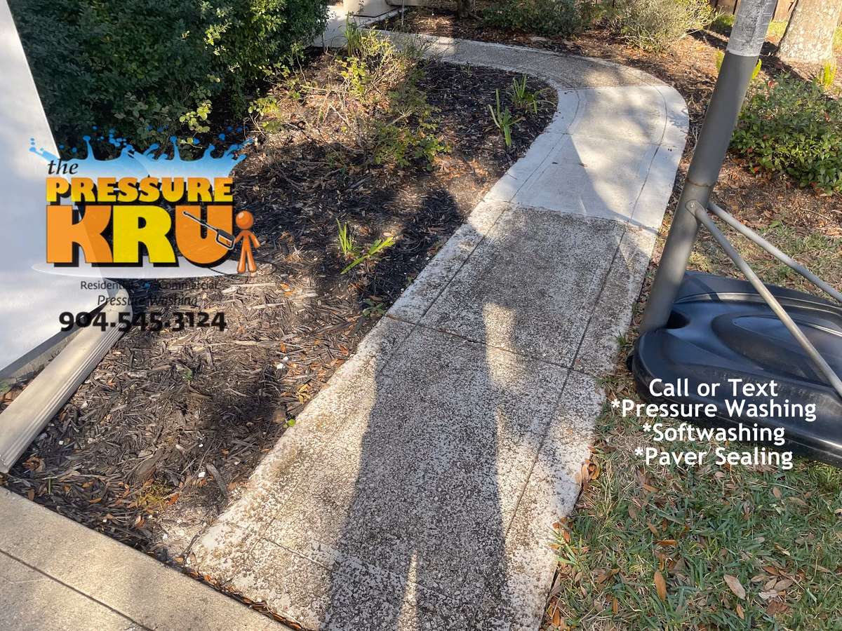 Professional painted sidewalk prior damaged by too much pressure gently cleaned in Cunningham creek before