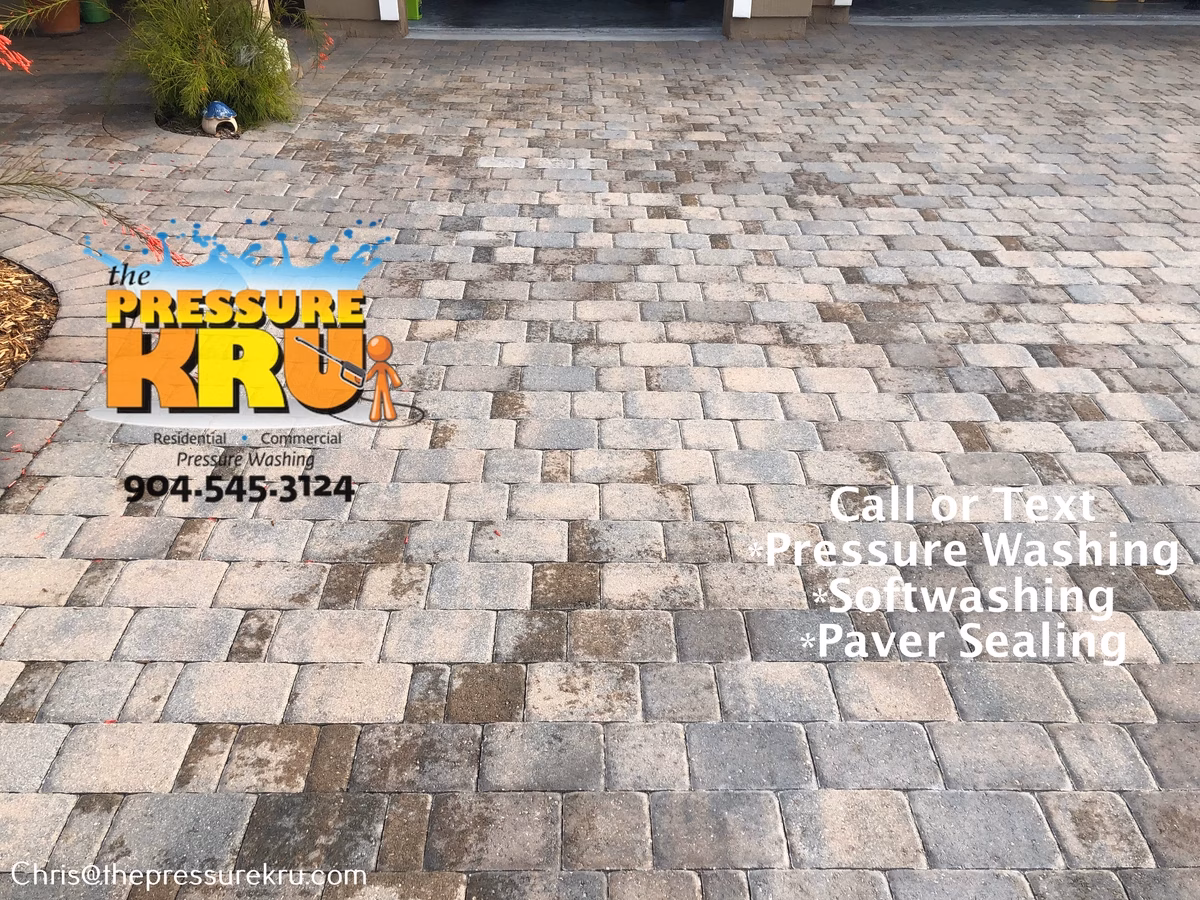 Bright clean paver driveway before pressure washing in Silverleaf Village.