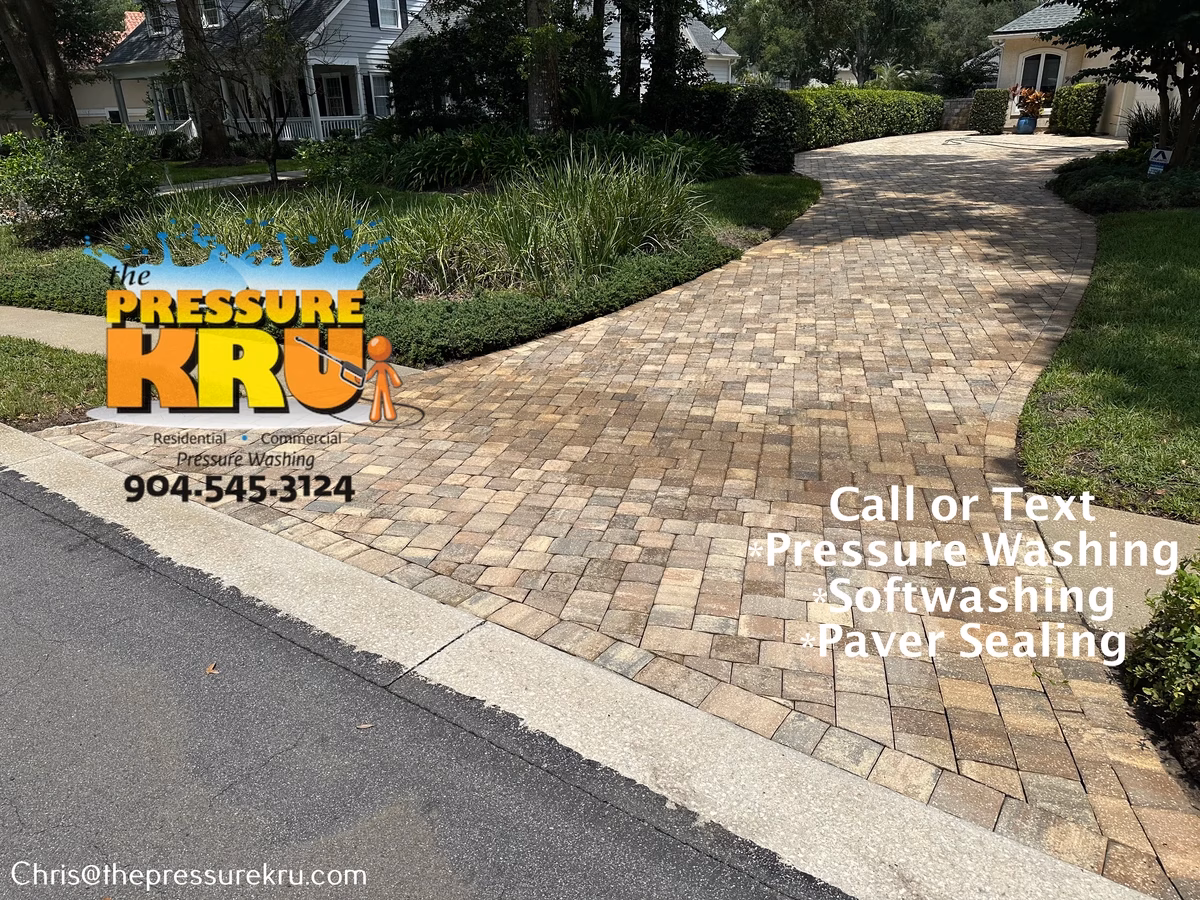 Paver driveway transformation after pressure washing in Stone Creek.