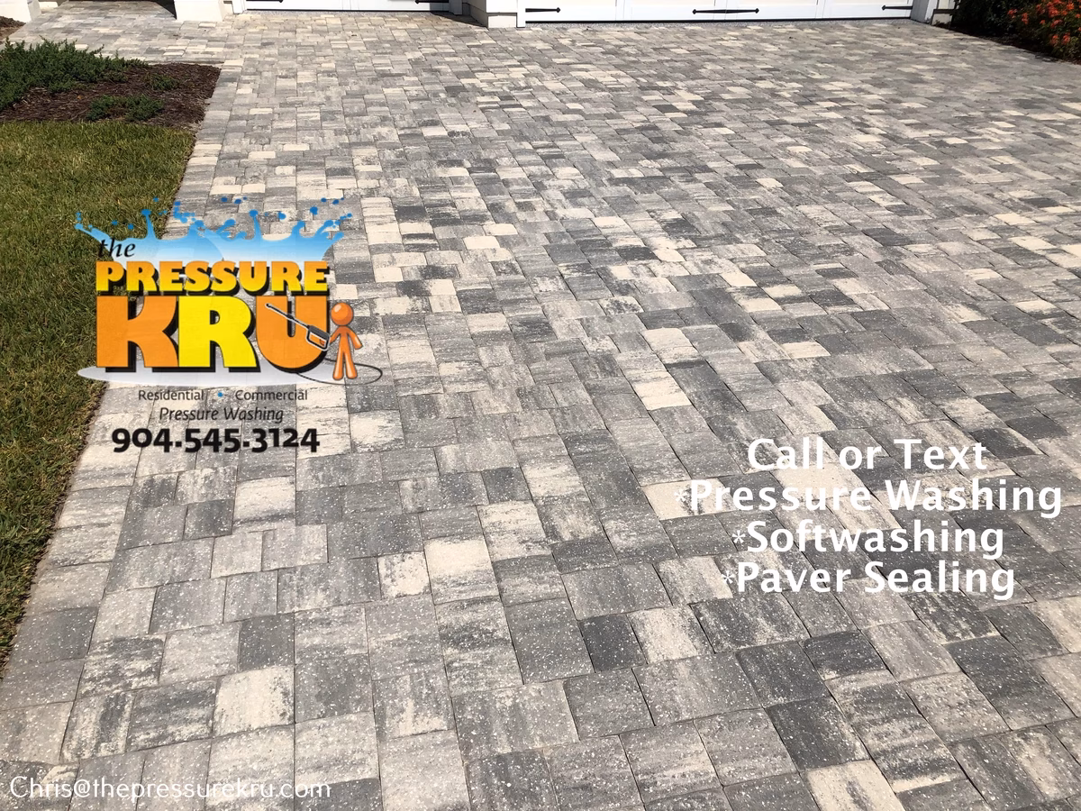 Paver driveway cleaning in Silverleaf Village after pressure washing.